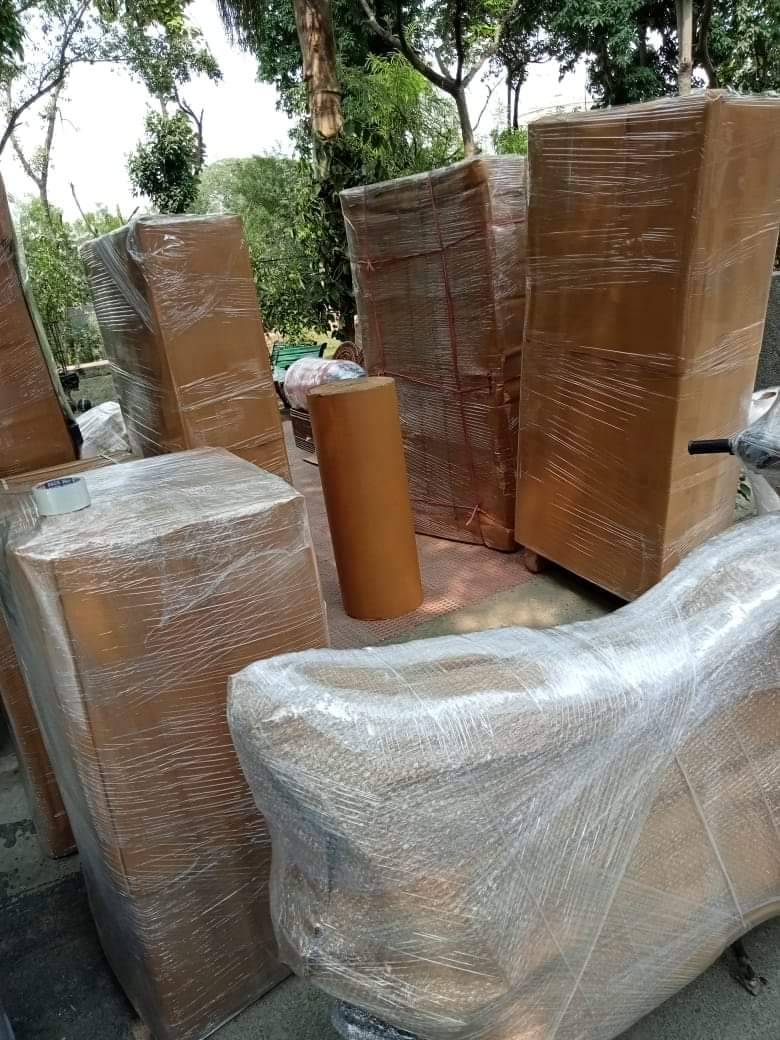 Large furniture items wrapped for household relocation